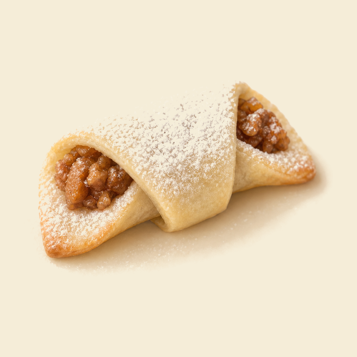A folded Turkish apple cookie filled with spiced apple